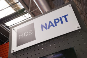 MCs and NAPIT logo side by side